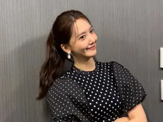 Yuna (Girls' Generation) terlihat sangat imut dengan kuncir kudanya... Menggemaskan dan murni