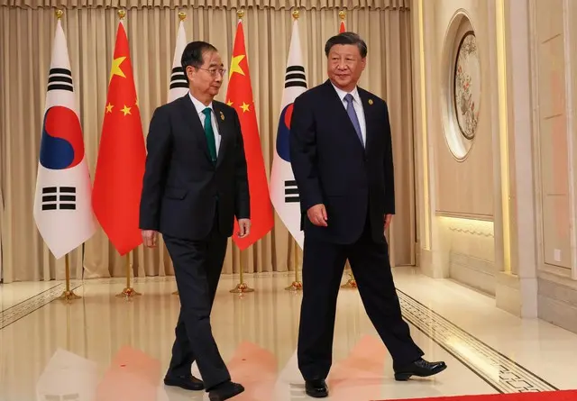 習主席と会談した韓国首相「韓中首脳間の交流や訪問を活発化で合意」