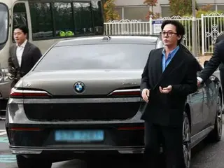 G-DRAGON (BIGBANG) is drawing attention to the reason why he rode in a BMW car when he appeared at the police station
