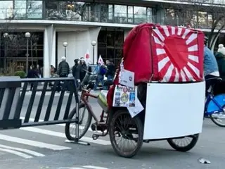 Saya memprotes becak bendera Matahari Terbit di New York, namun tanggapannya adalah ``Itu di luar yurisdiksi saya'' = profesor Korea