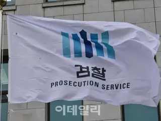 Adegan di mana “Moon Jae-in XXX” digrafiti di dinding luar Kantor Kejaksaan Tinggi Seoul