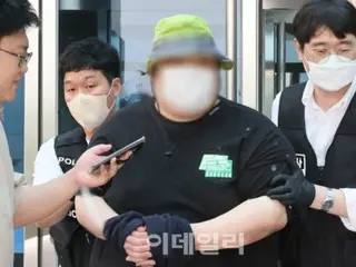 ``Saya akan membunuh 50 orang di Stasiun Seoul''...Seorang pria berusia 30-an tetap diam saat dia berdiri di persimpangan jalan untuk ditahan.