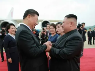 Kim Jong-un mengirimkan telegram ucapan selamat kepada Presiden Xi Jinping pada Hari Nasional... ``Memperkuat persahabatan antara kedua negara''