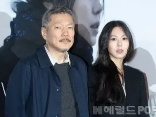 Apakah ini pertimbangan untuk Kim Min Hee, yang sedang dalam bulan terakhir kehamilannya? Sutradara Hong Sang Soo dan pacarnya di karpet merah bersama merupakan sebuah kegagalan... Akankah dia muncul di konferensi pers?