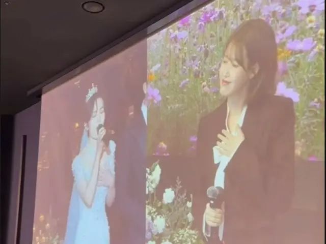 IU memenuhi kewajibannya dengan lagu pernikahan meskipun jadwalnya sibuk...duet ``The Meaning of You'' dengan pengantin wanita